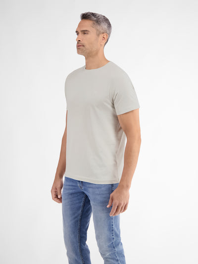 Basic T-shirt met logosteek, effen kleur