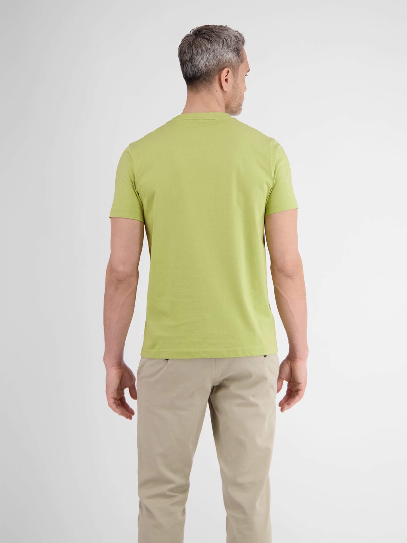 Basic T-shirt met logosteek, effen kleur